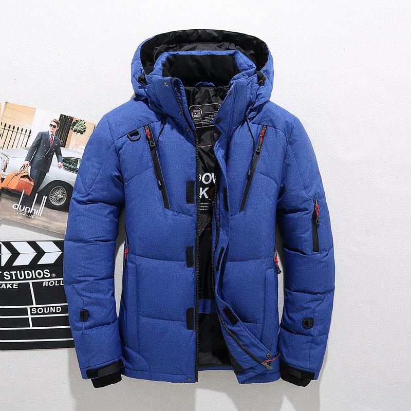 Men's waterproof winter puffer jacket with hood and fleece lined collar in Blue